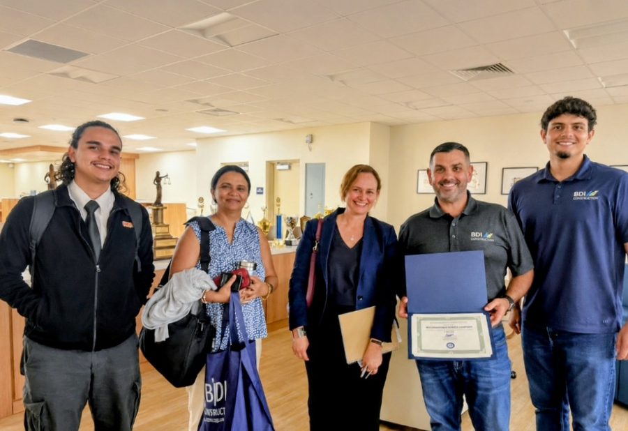 BDI Construction staff receiving a certificate of recognition