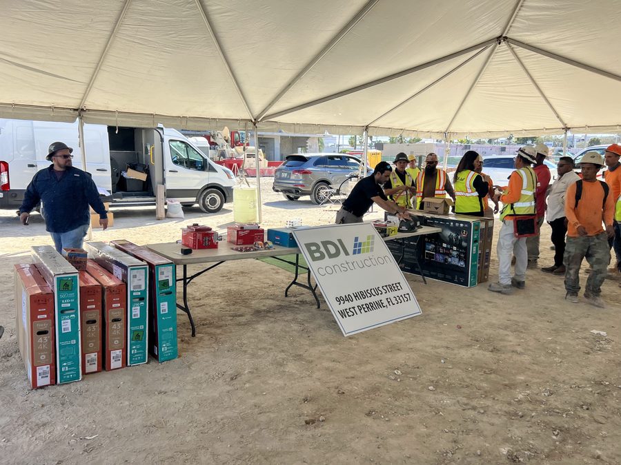 Prizes laid out for the trades at a BDI Construction jobsite appreciation event