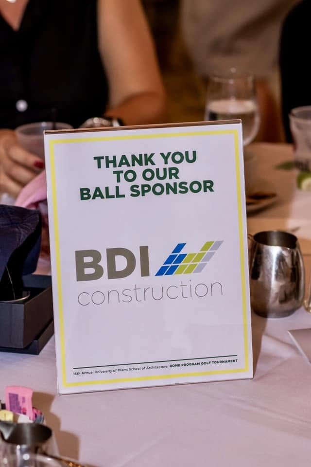 BDI Construction's sponsor card at a charity golf tournament
